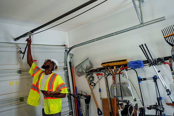 Professional Garage Door Panel Replacement technician working in Le Mars, IA